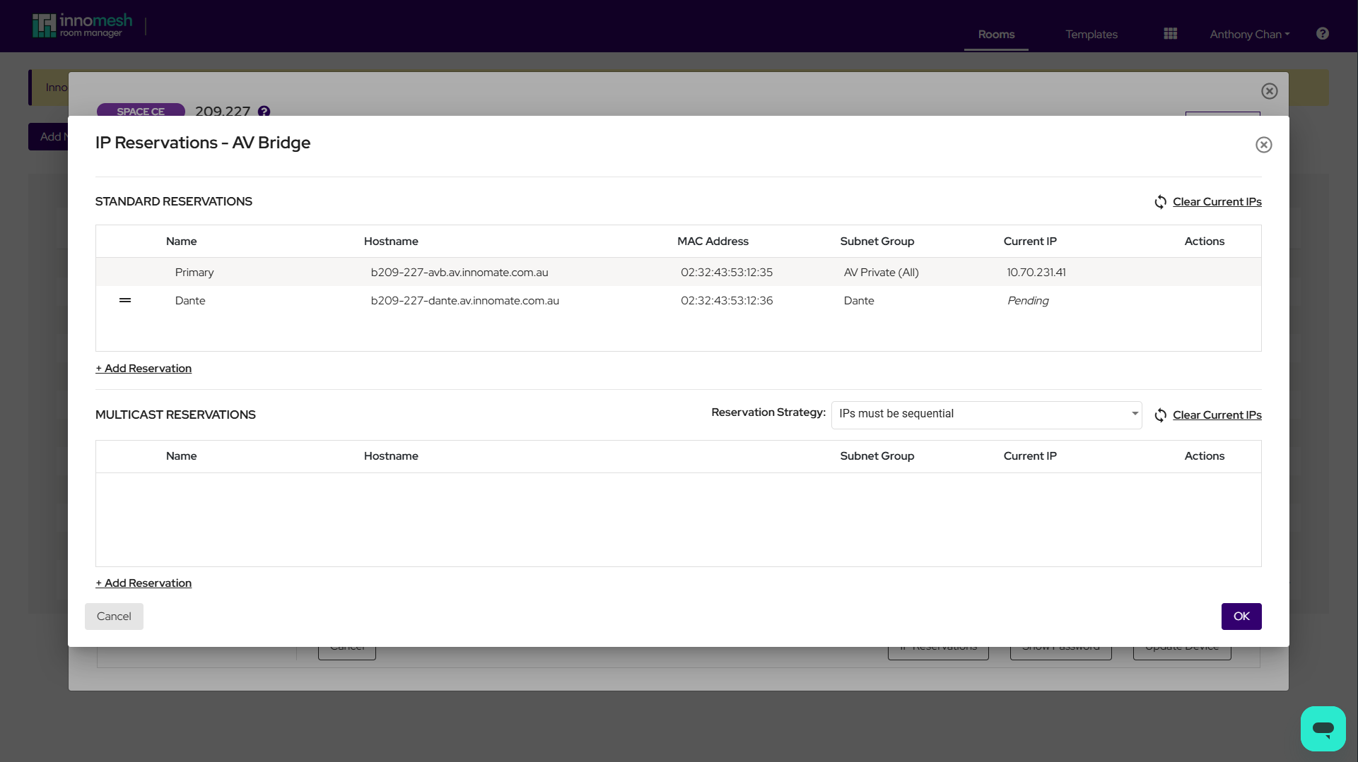 IP Reservations modal listing Standard Reservations and Multicast Reservations tables for a device