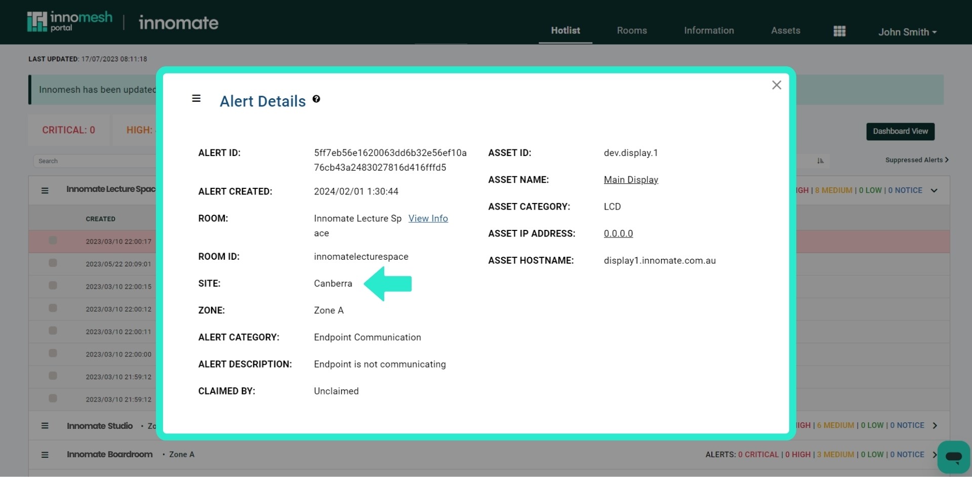 Alert Details modal listing Alert ID, Room, Site Canberra, Zone, Asset metadata, and description fields